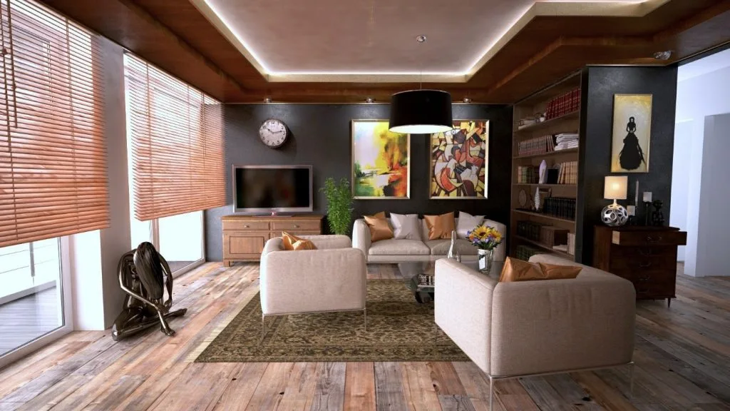 Cozy living room interior with sofa, armchairs, wood floors, and modern decor. Stylish home design for relaxation.